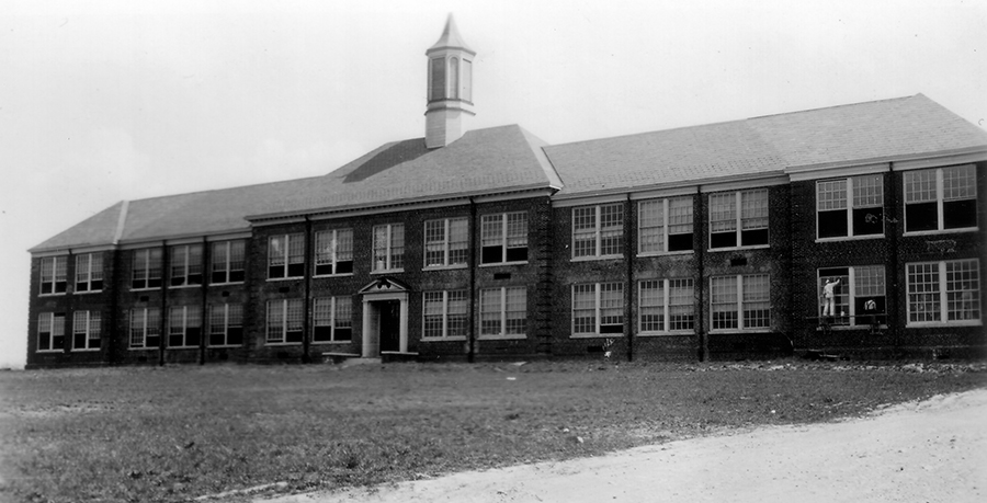 Black and white photograph of the front exterior of Mount Vernon High School.