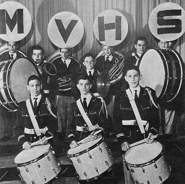 Black and white yearbook photograph of marching band members.
