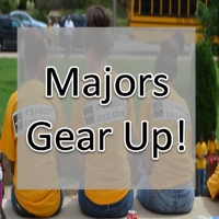 Image of 3 students sitting in back of the Majors Gear Up message